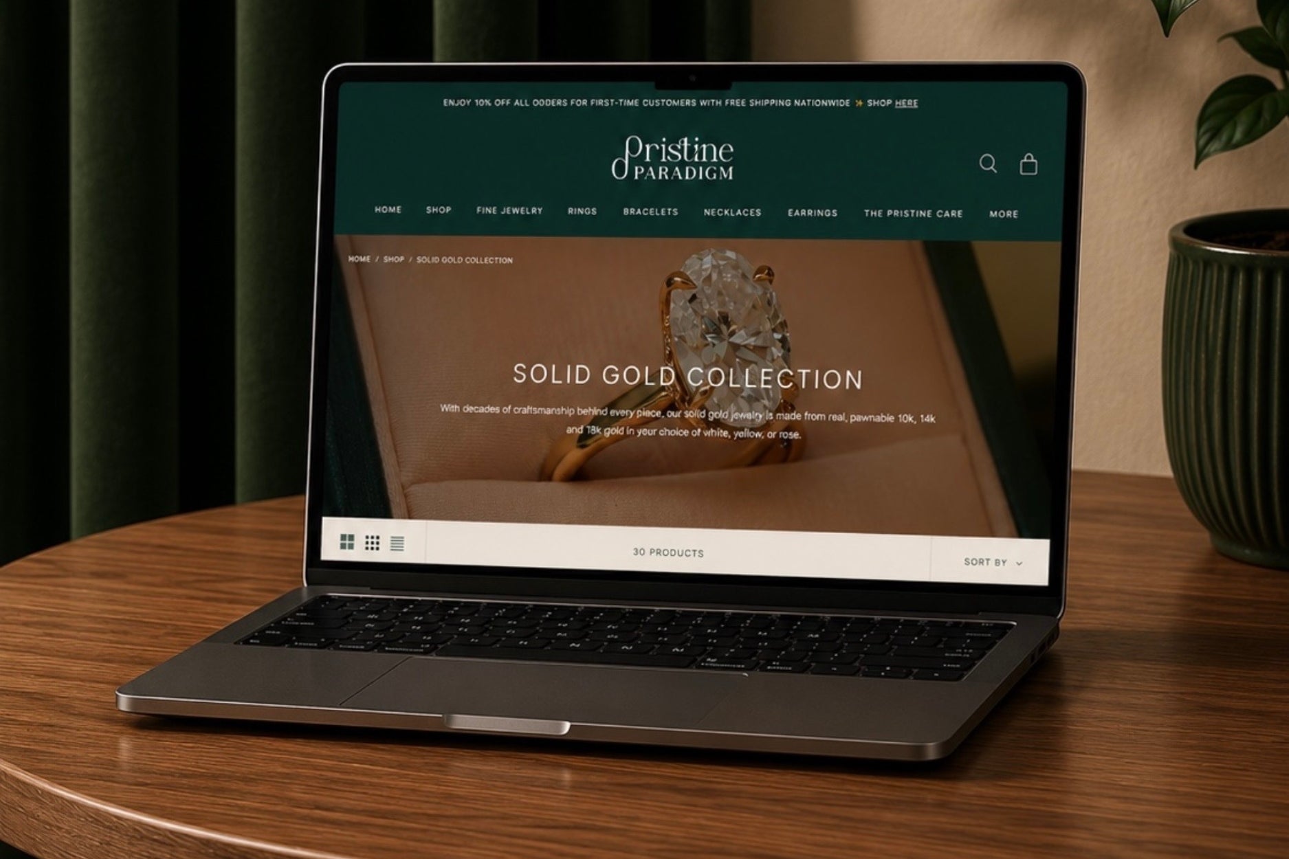 Laptop displaying an online solid gold jewelry collection.