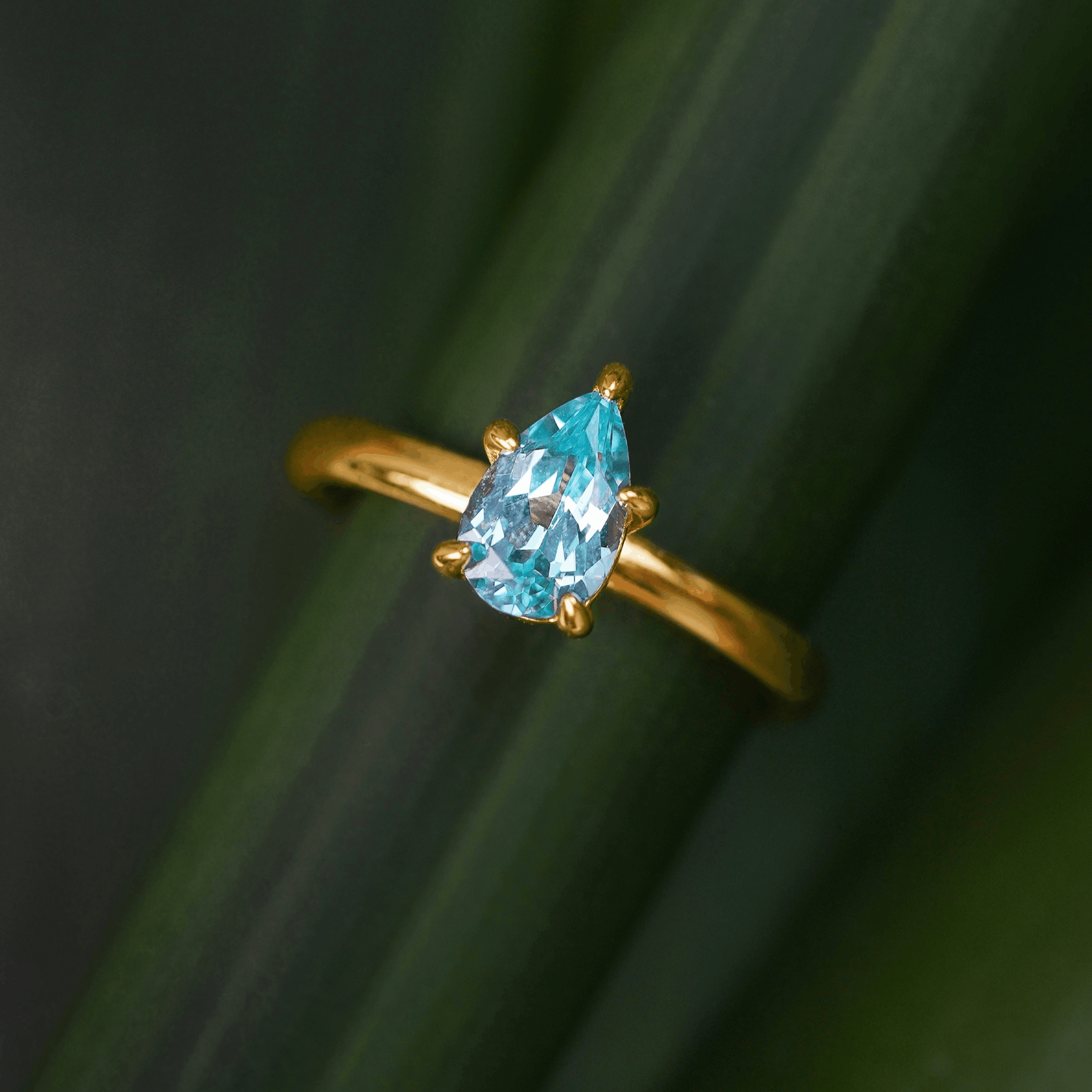 Thia Pear Solitaire Ring (Paraiba)