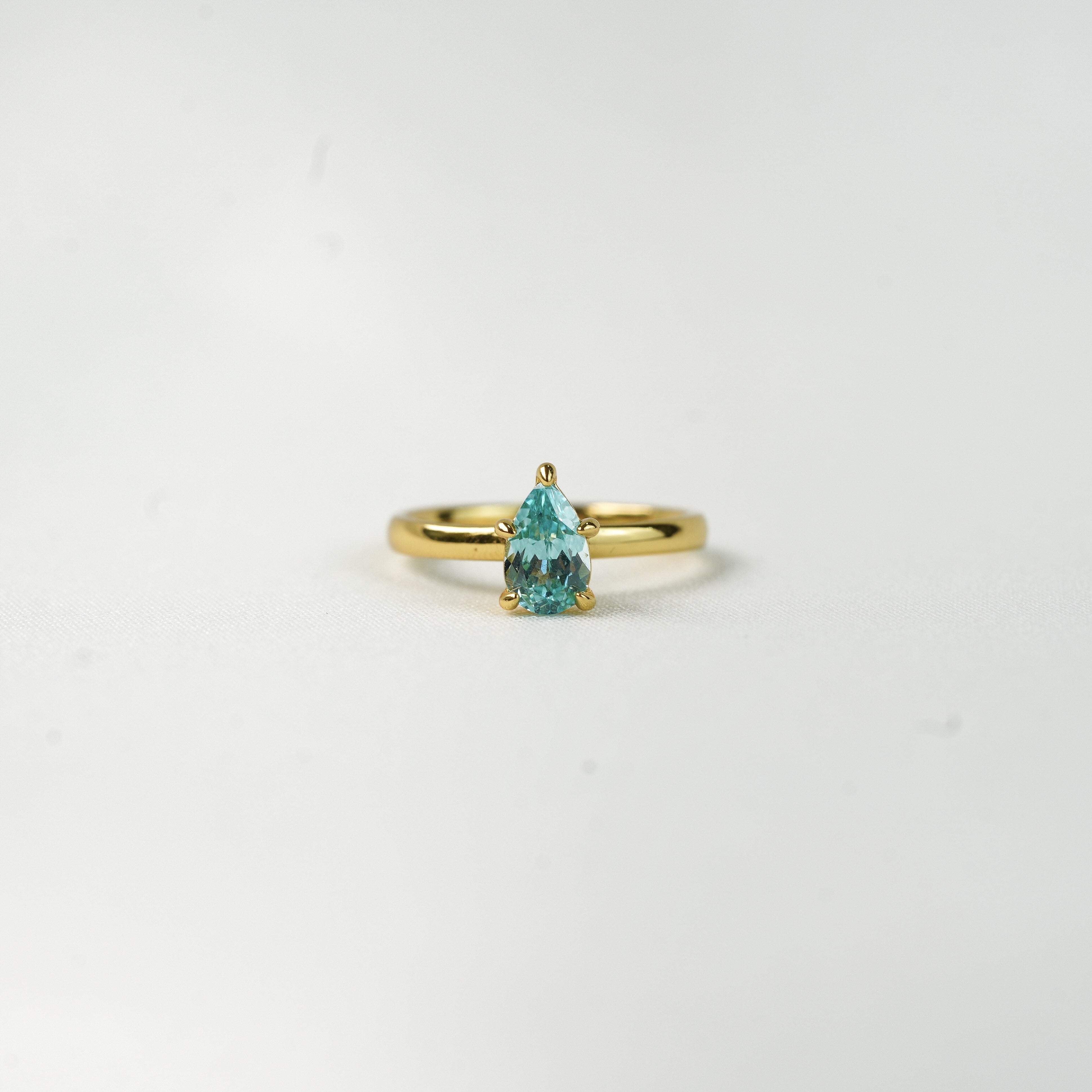 Thia Pear Solitaire Ring (Paraiba)