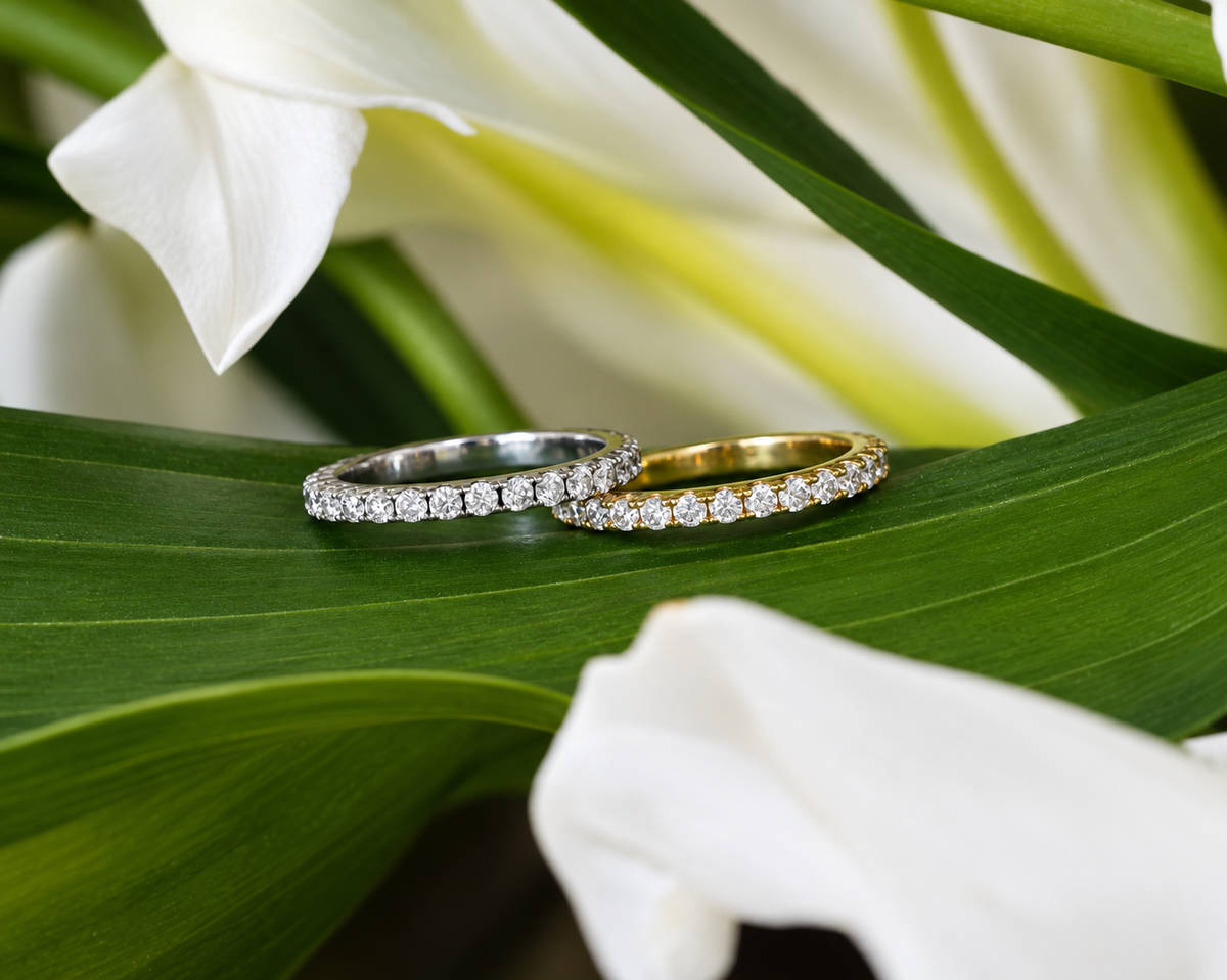 Diamond eternity rings in white and yellow gold