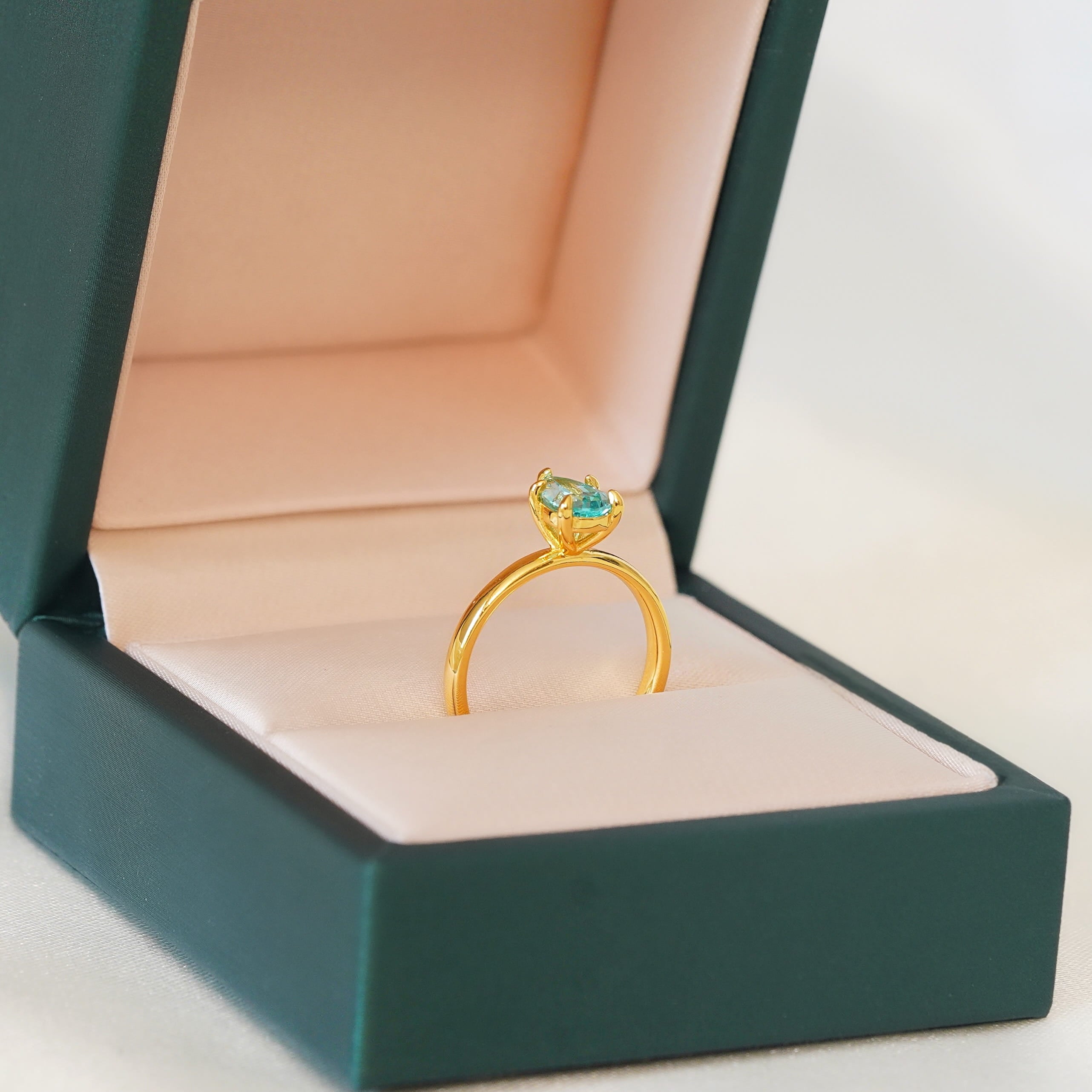 Thia Pear Solitaire Ring (Paraiba)